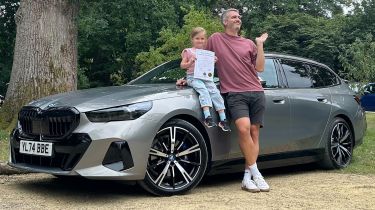  BMW 530e Touring long-term - header with child's school marks